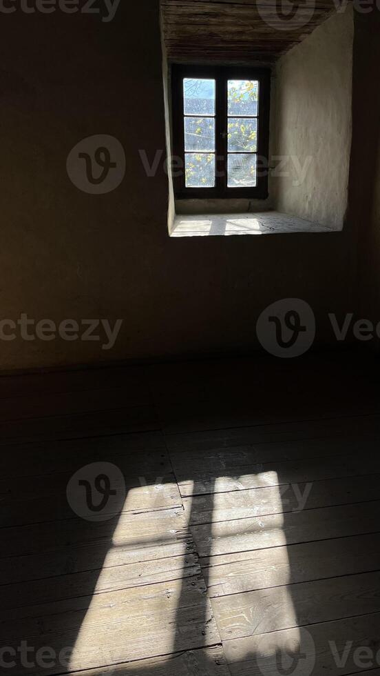 Sunlight from the window through the ancient windows in the castle, view from the inside. Poland photo