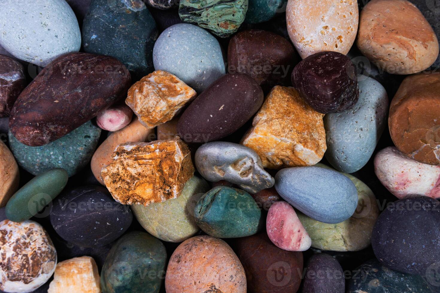 Sea pebbles, multicolored brown sea pebbles as a background. Background photo