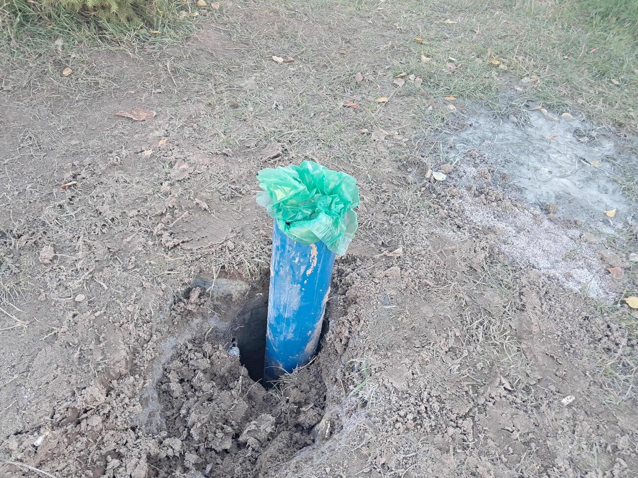 Construction team digging a fresh water well photo