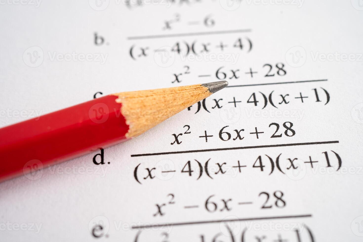 Pencil on mathematic formula exercise test paper in education school. photo