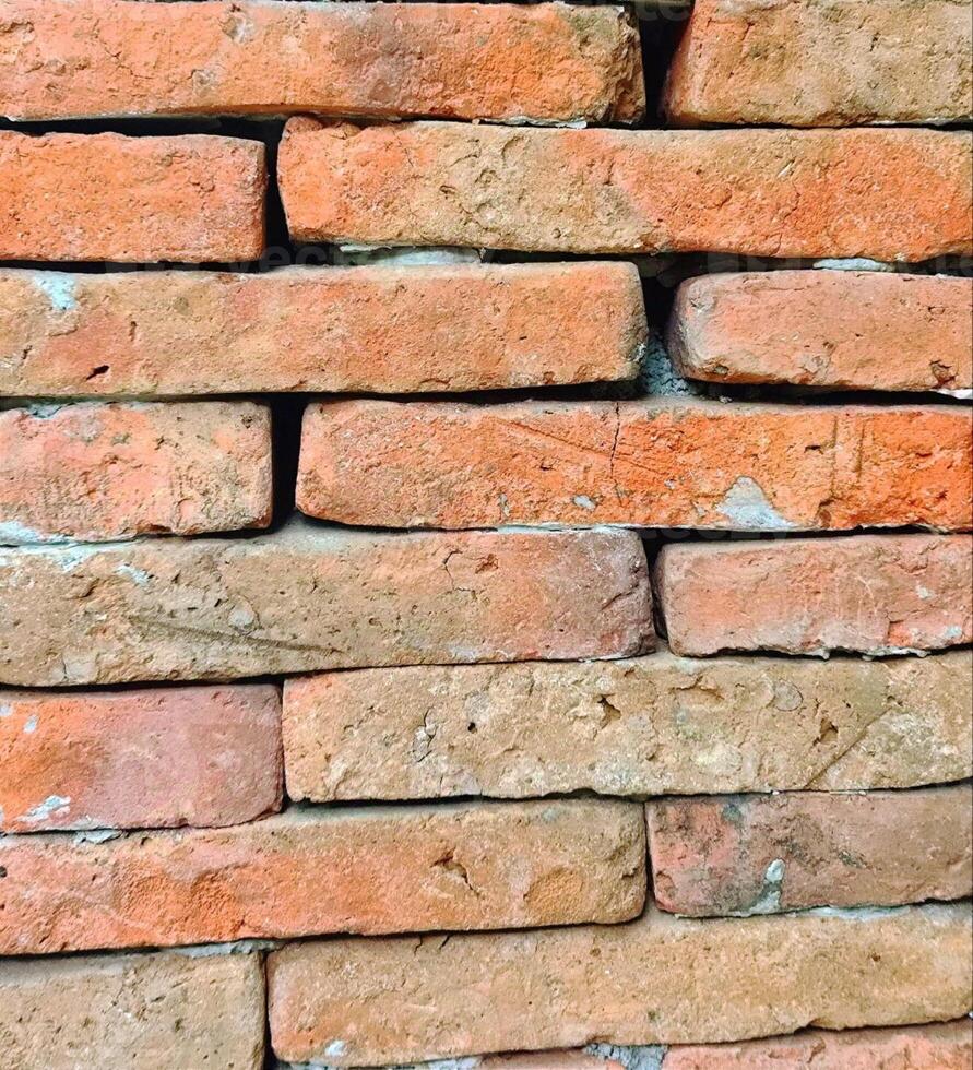 A brick wall with many different colors photo