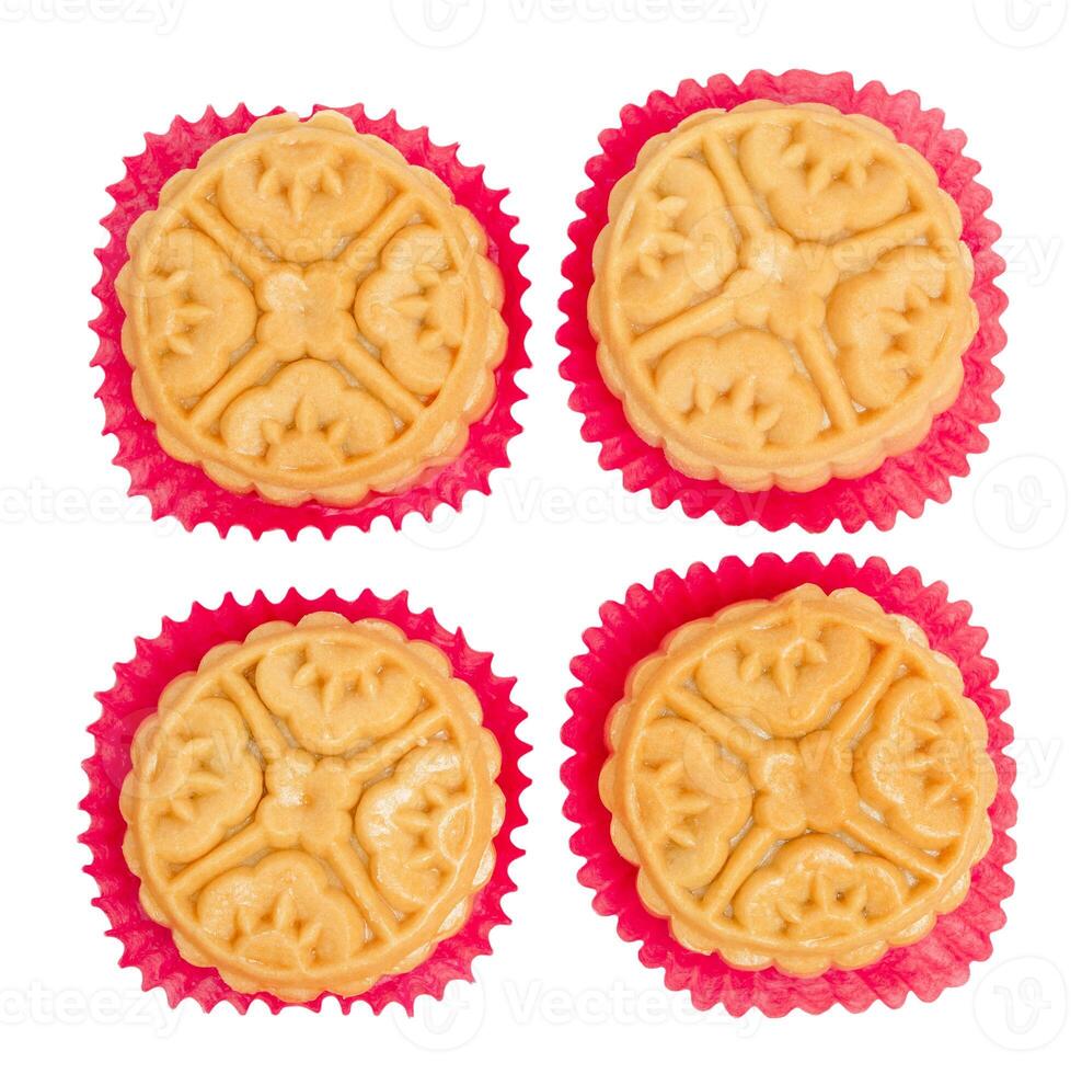 Top view Four mooncakes for Chinese Mid Autumn Festival celebration on white background. photo