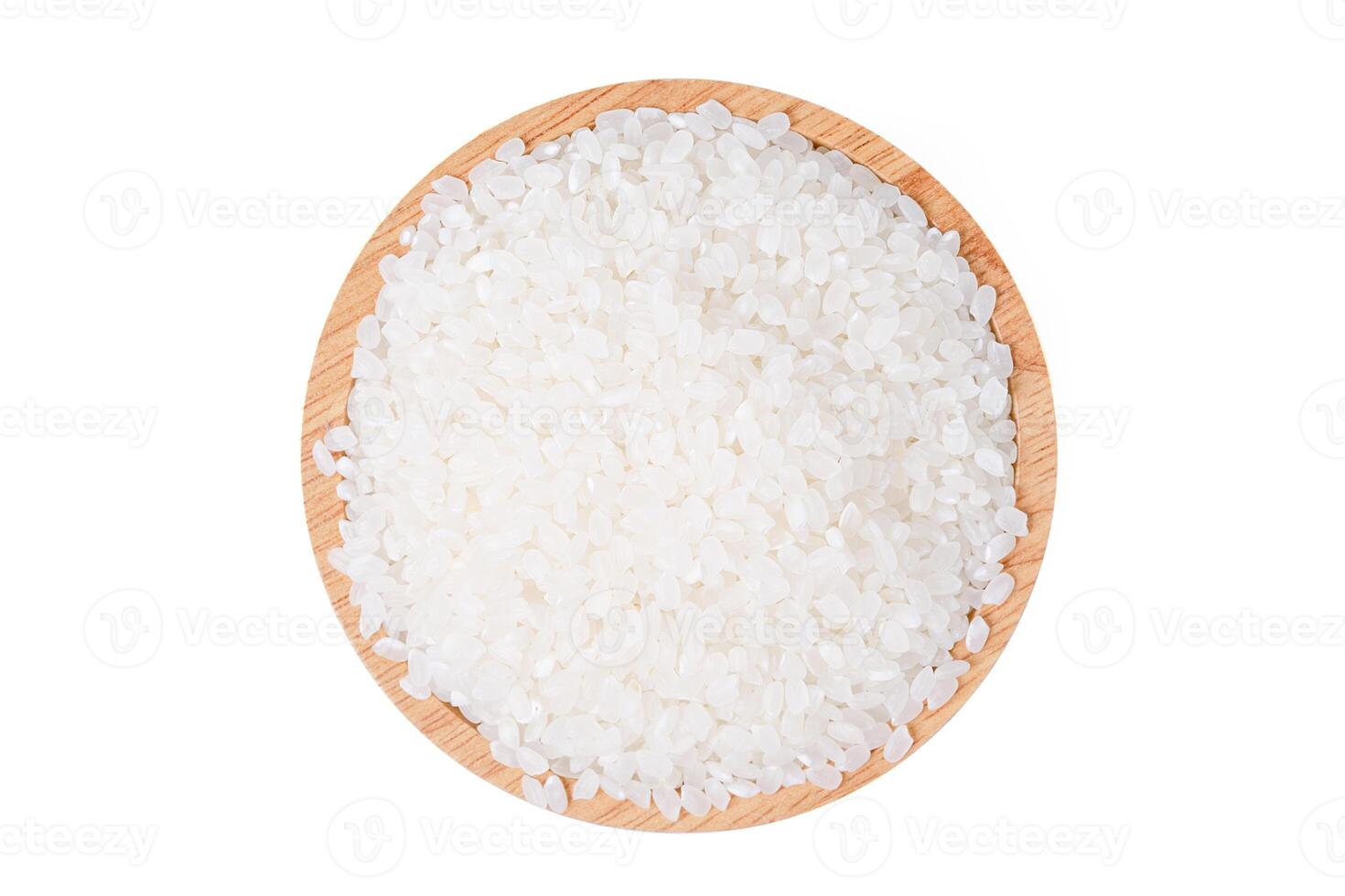 Raw rice japanese with wooden bowl white on background. photo