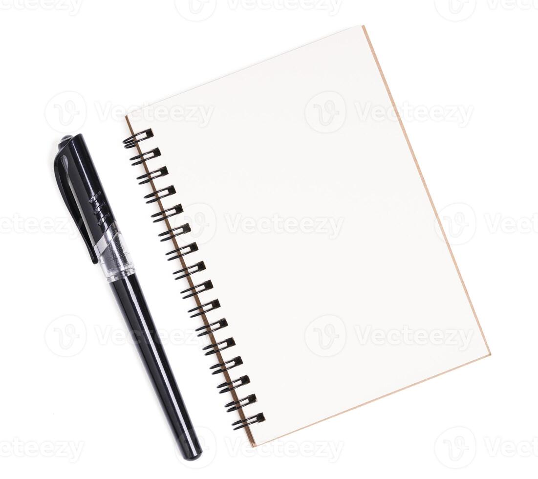 Top view of spiral kraft notebook front on white background. photo