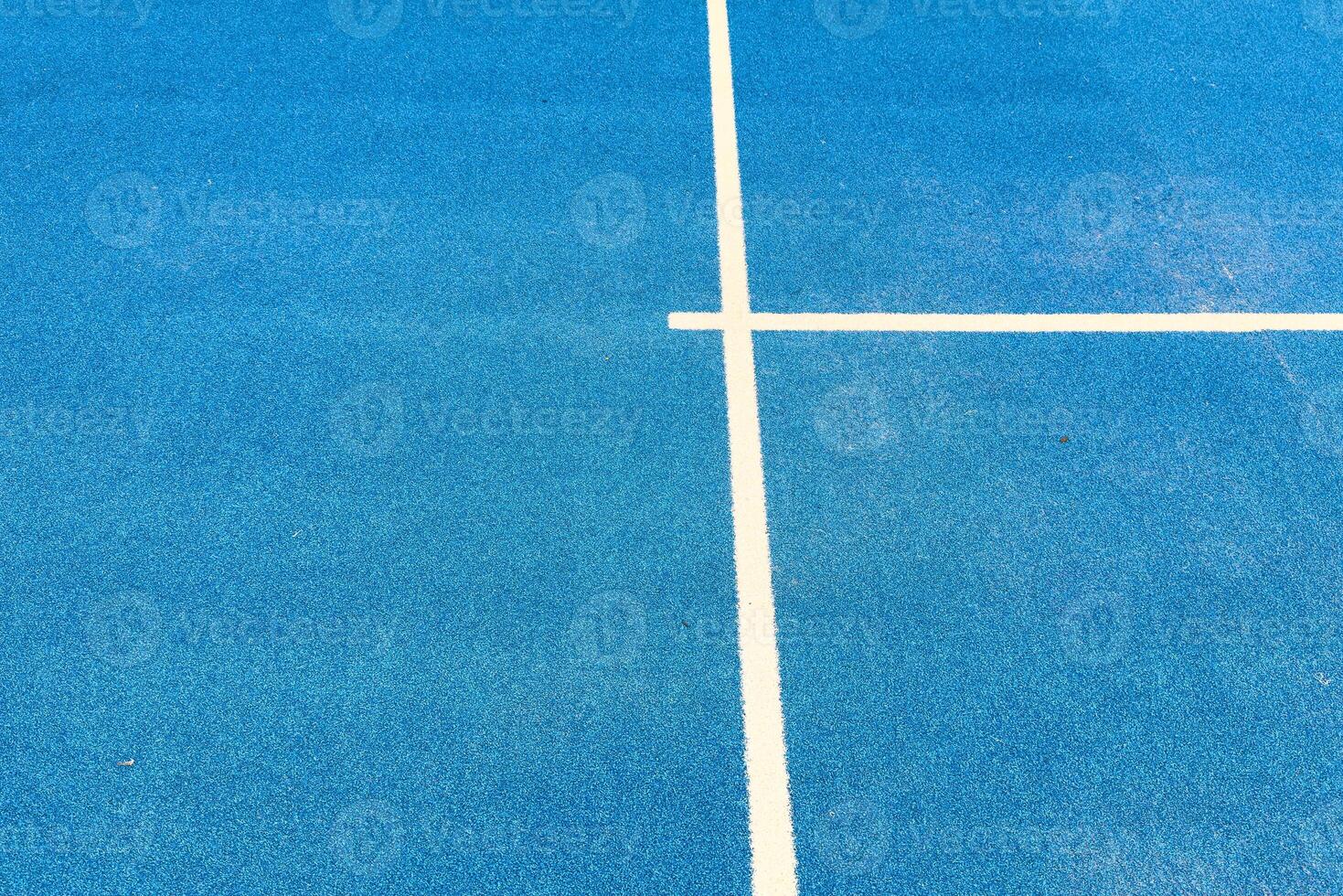 blue paddle tennis court, aerial shot photo