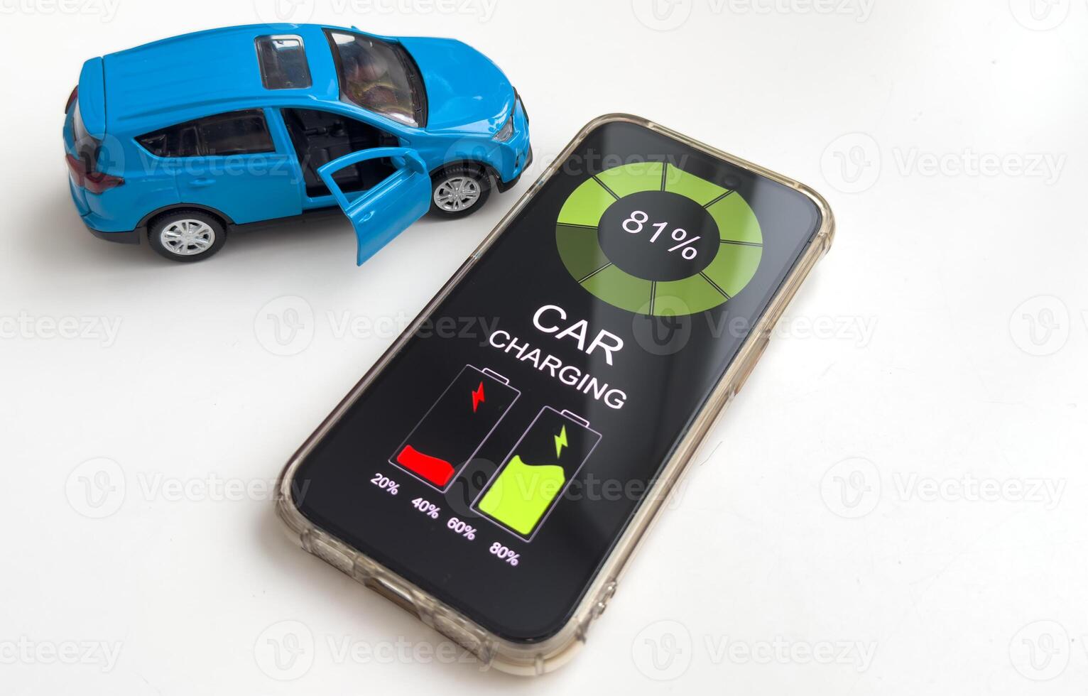 Car security concept - key with remote alarm control and smartphone photo