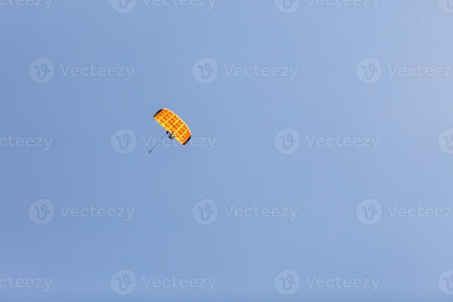 Skydiving. Tandem jump. An amazing adventure into the sky. photo