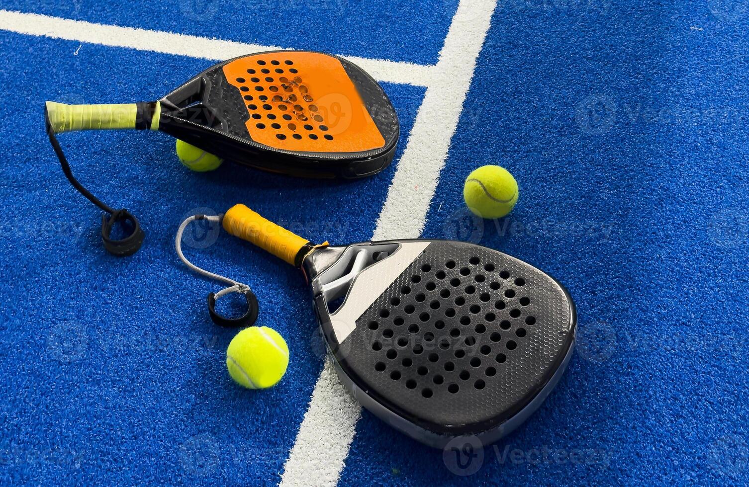 padel tennis racket sport court and balls photo