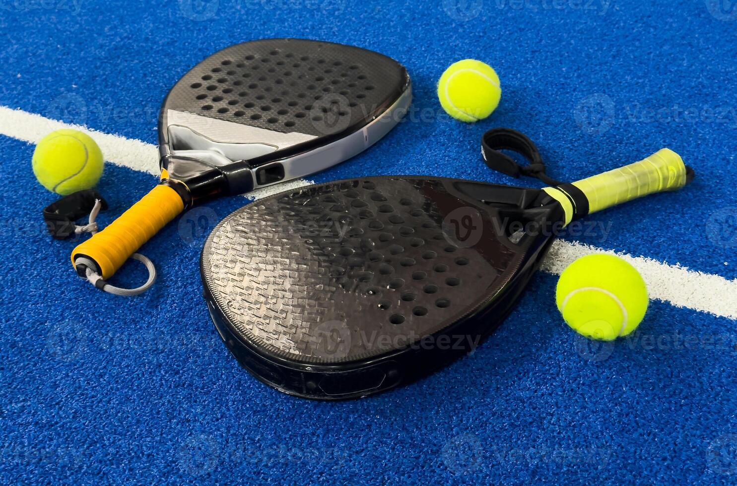 padel tennis racket sport court and balls photo