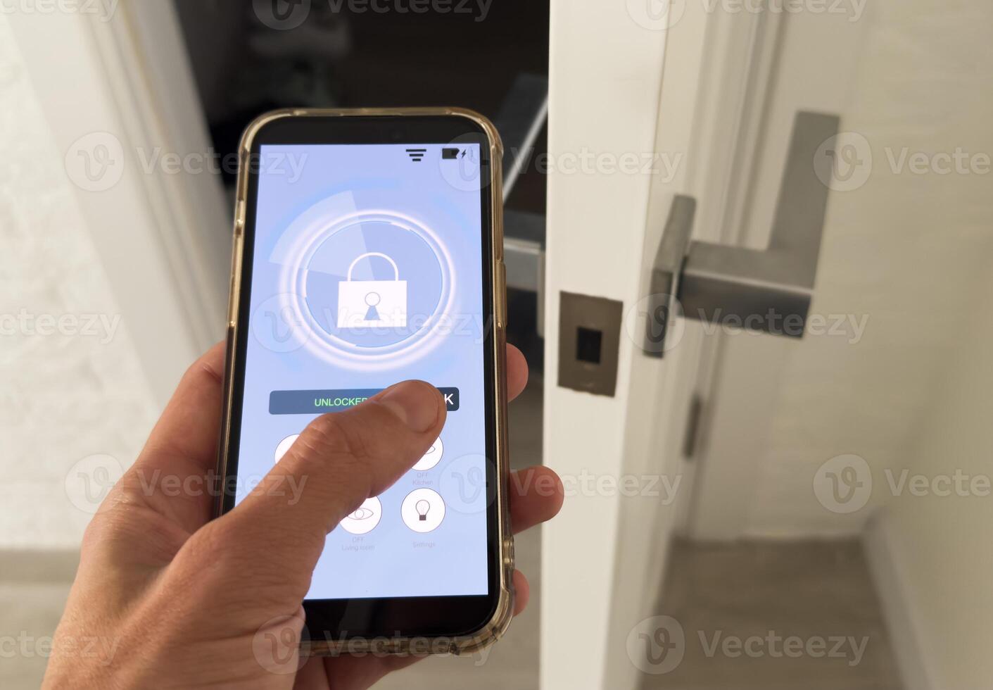 Smart house, home automation, device with App icons. Man uses his smartphone with smarthome app to control the lights of his house. photo