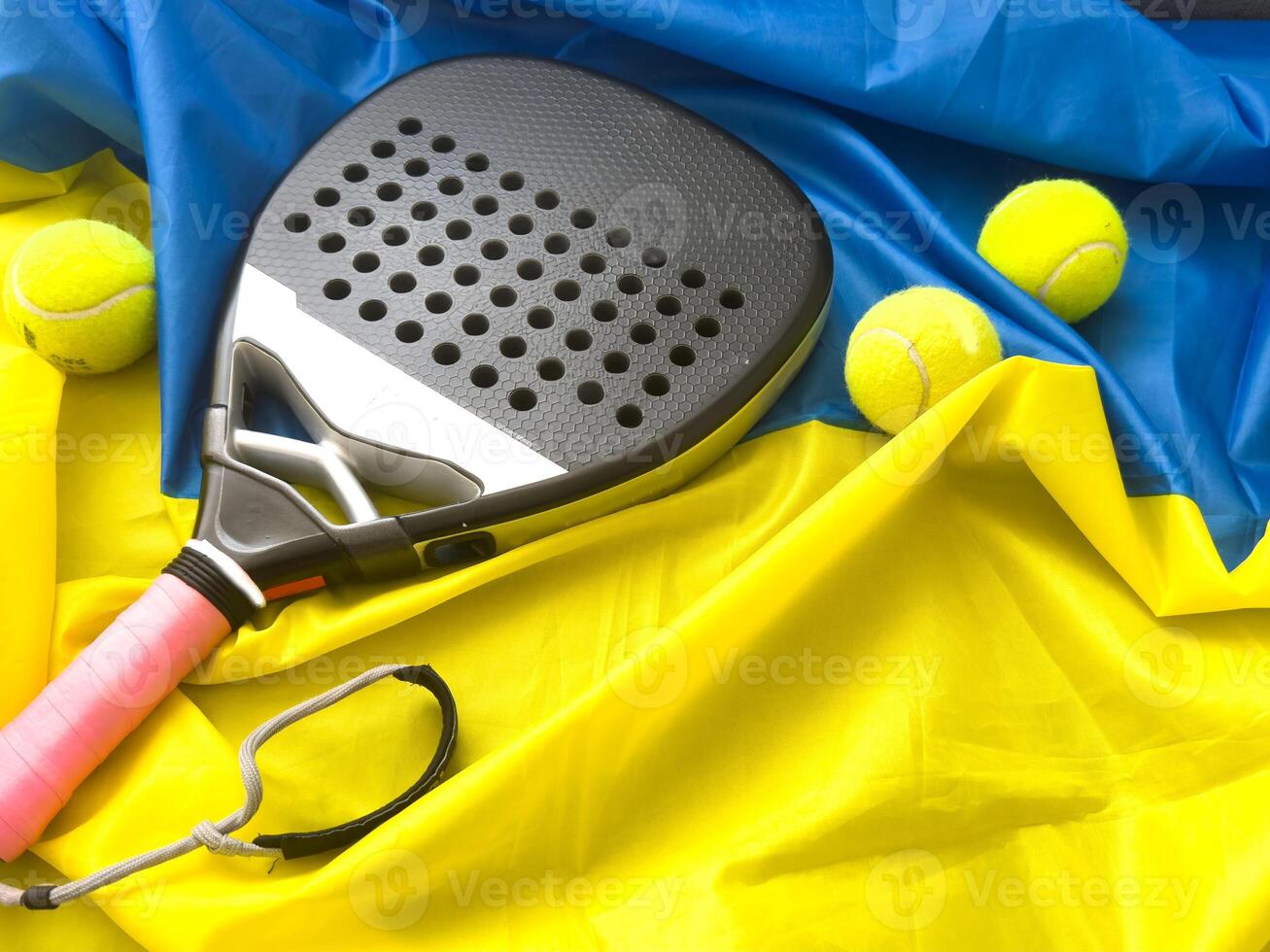 Ukrainian flag and padel racket photo
