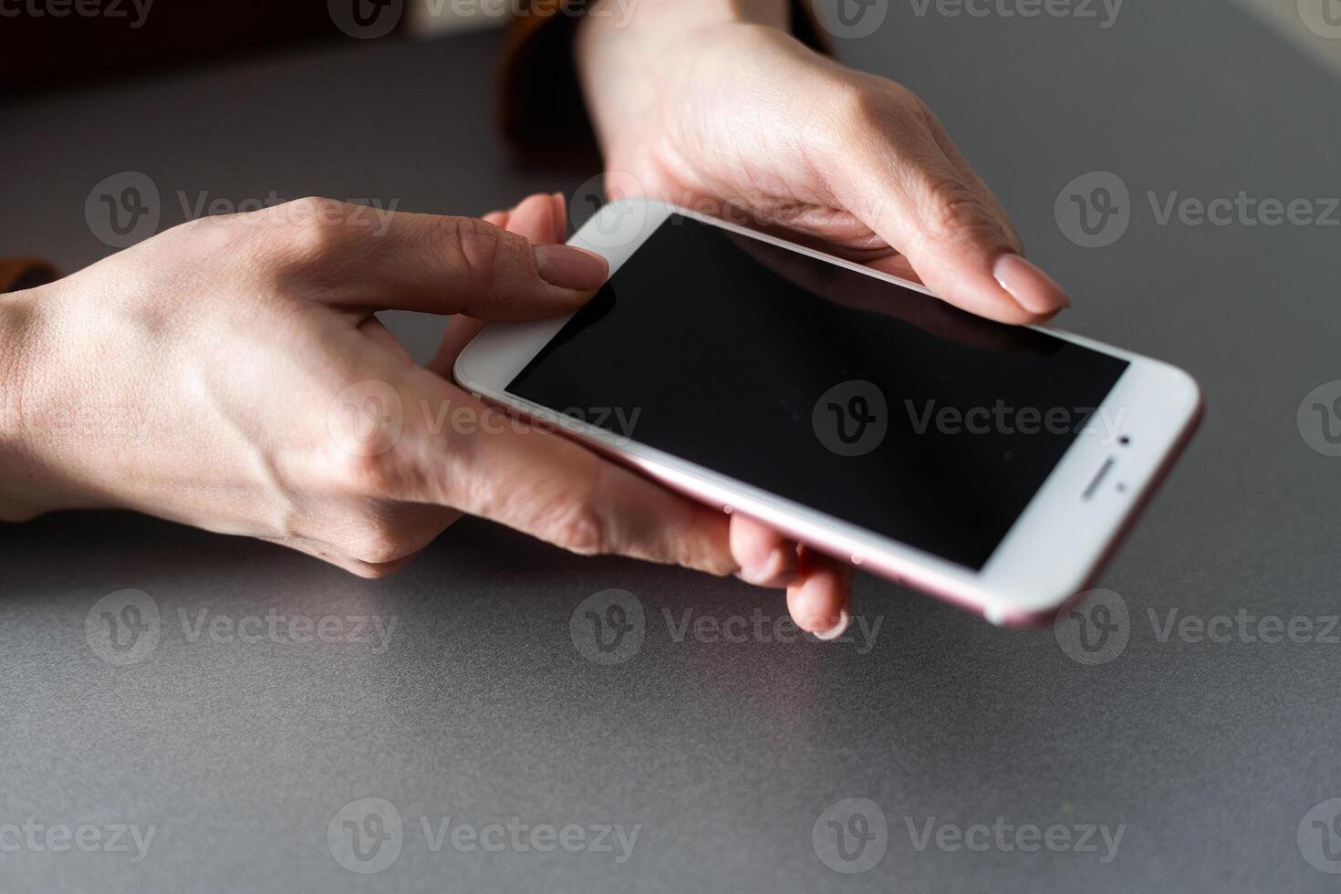hands pressing smartphone buttons. Finger tapping photo
