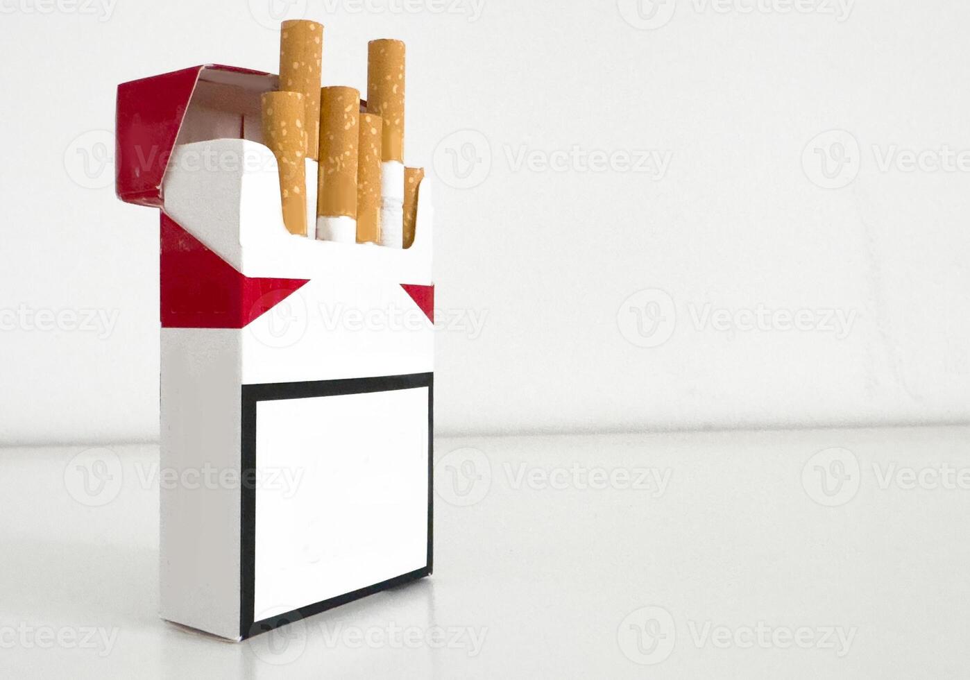 peel it off Cigarette pack prepare smoking a cigarette. Packing line up. photo filters Natural light. soft focus