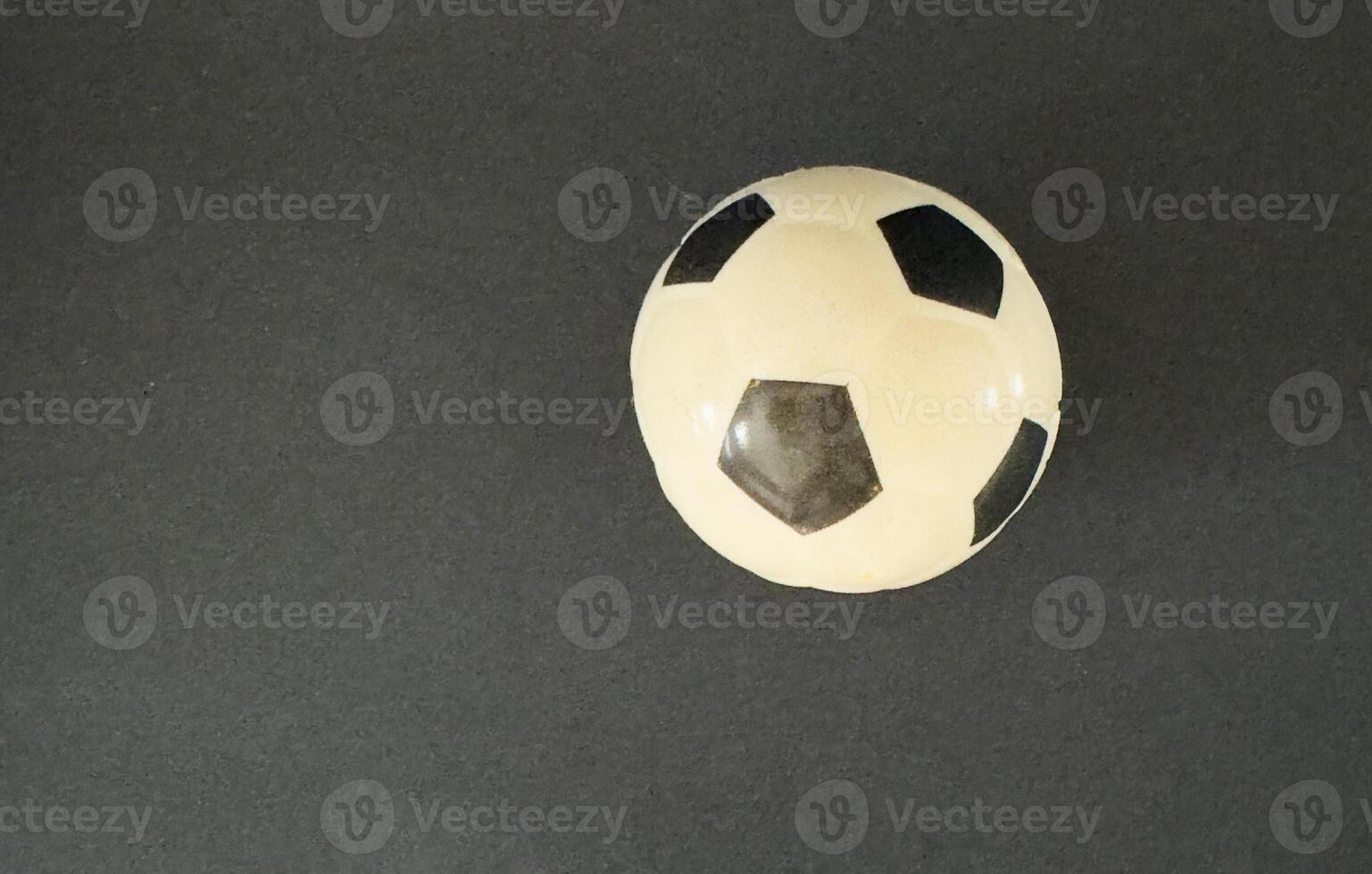 Soccer ball goal success on black background photo
