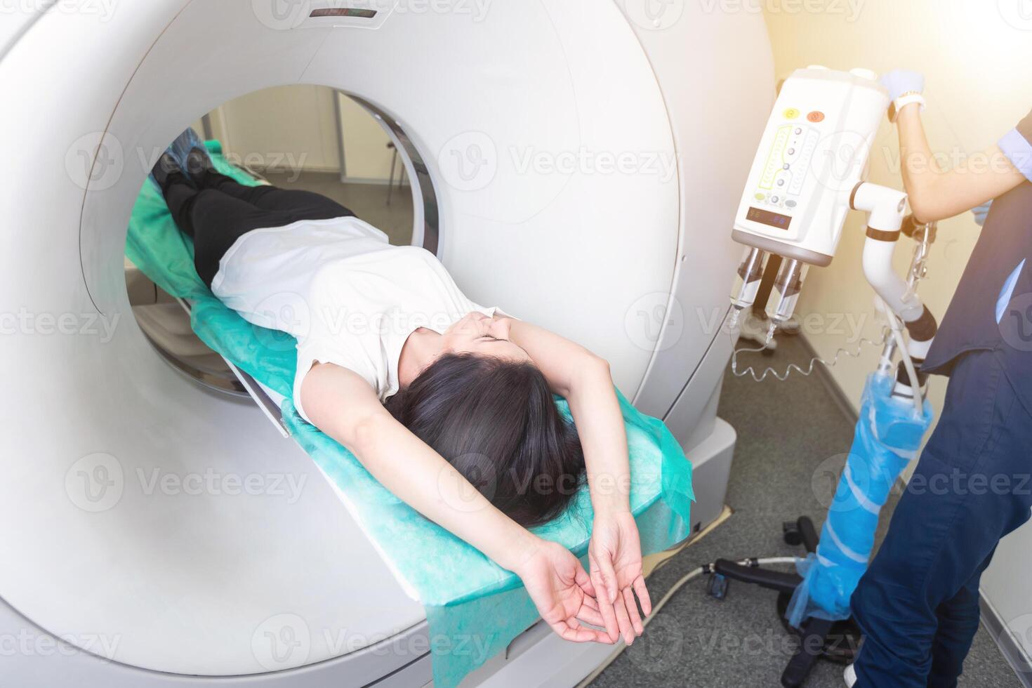 Computed tomography of the pelvis and hard tissues for women. CT scan to cure tissue diseases. Professional diagnosis of the organs of a young girl. photo