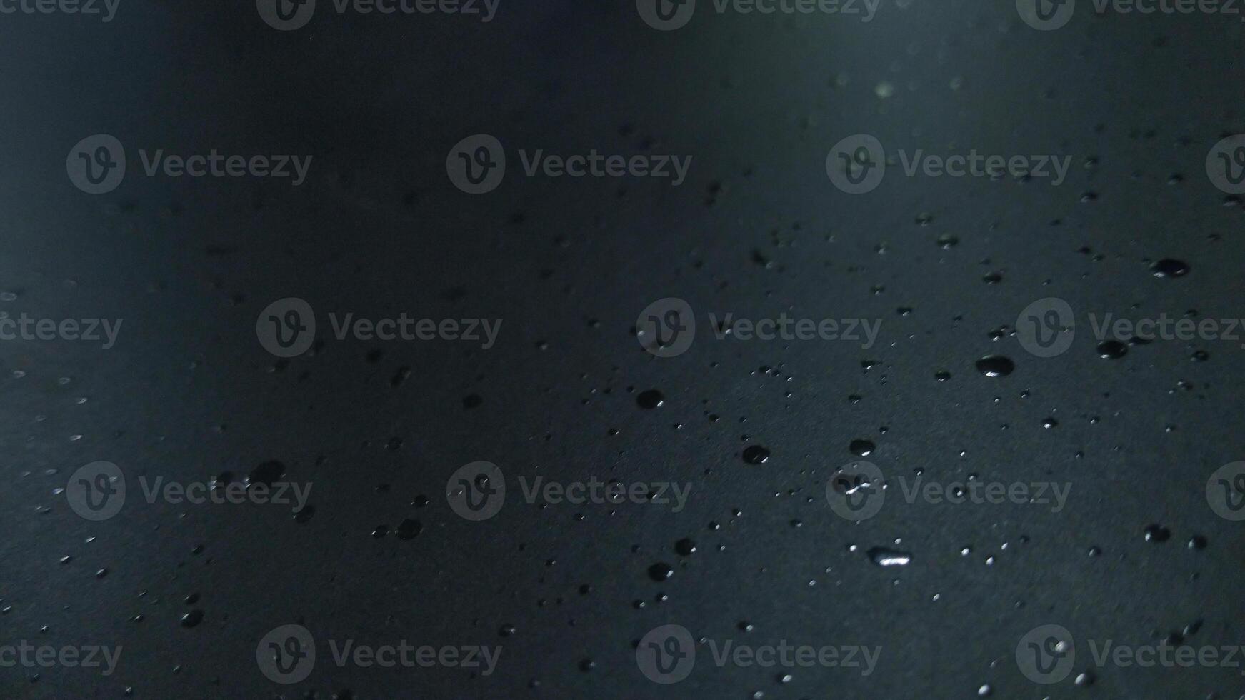 Abstract Dark Surface with Water Droplets photo