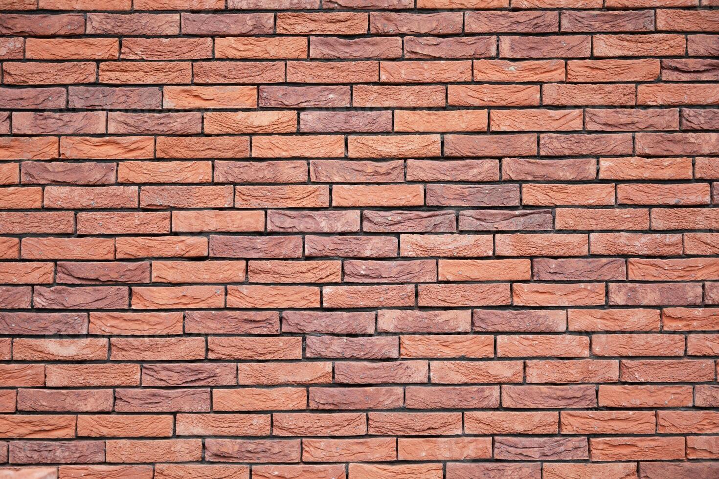 red textured brick wall, long and narrow modern bricks, horizontal decorative masonry, Textured stone background, brickwork outside new building, photo