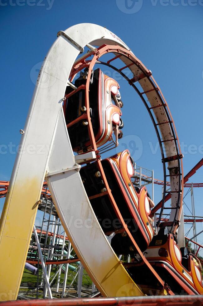 Rollercoaster at funfair photo