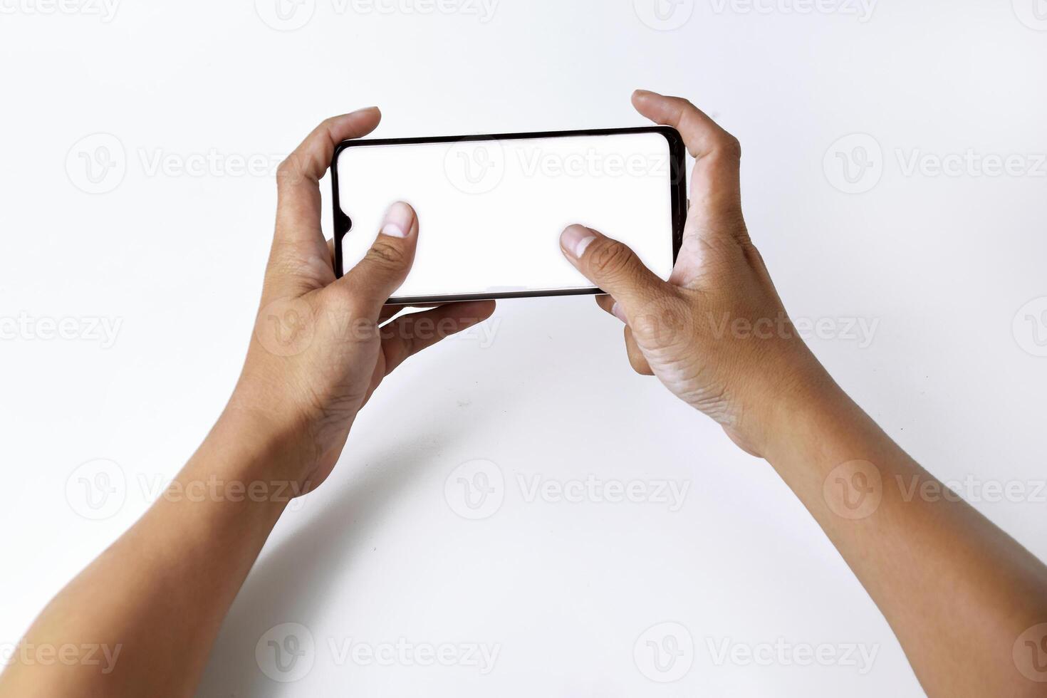 Someones hand is pressing and pointing at the screen of a smartphone photo