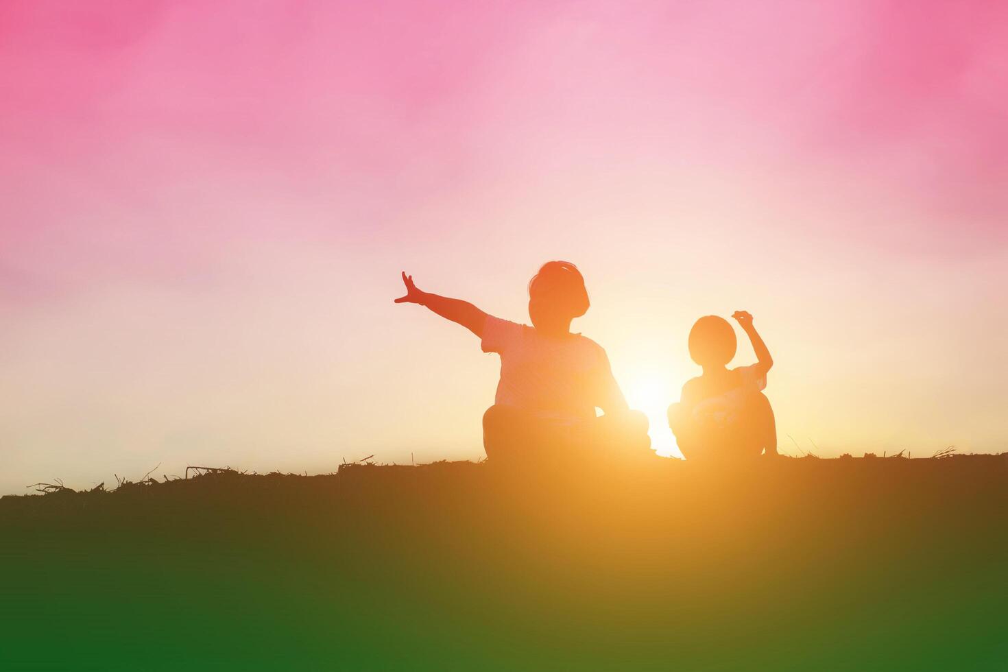 kid silhouette,Moments of the child's joy. On the Nature sunset photo