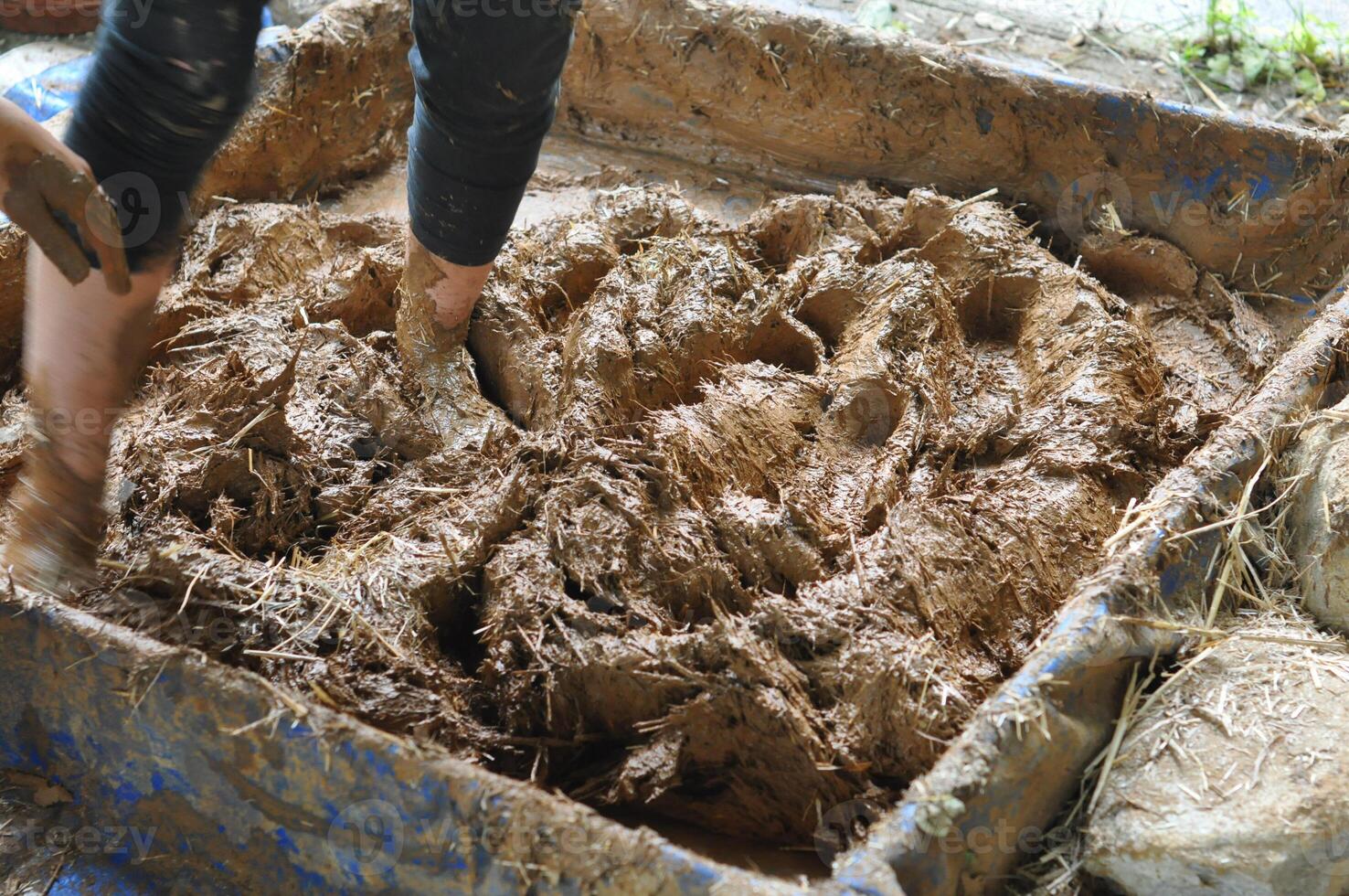 raw earth plaster preparation photo