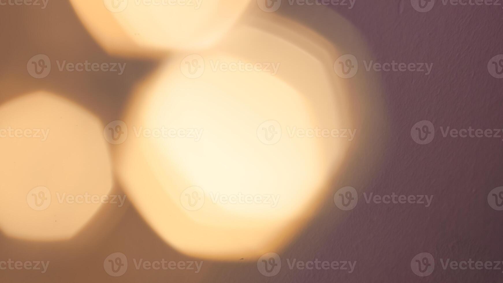 Bright golden bokeh lights create a festive and sparkling holiday ambiance photo