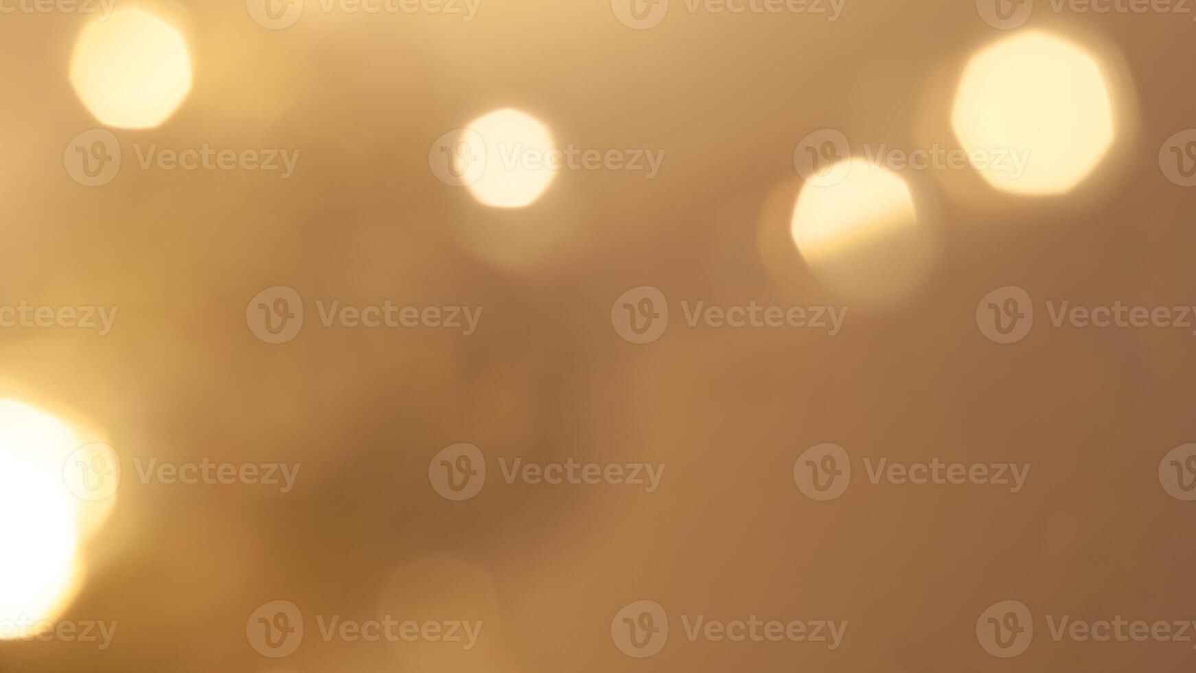 Soft golden bokeh background with a subtle glowing and elegant festive ambiance photo