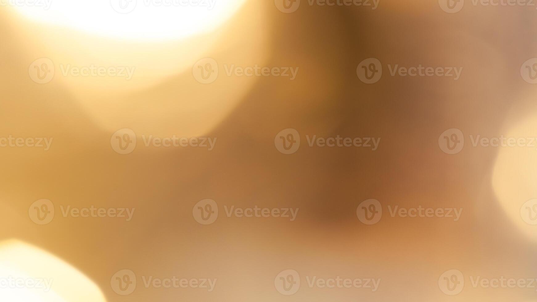 Bright golden bokeh lights create a vibrant and festive holiday background photo