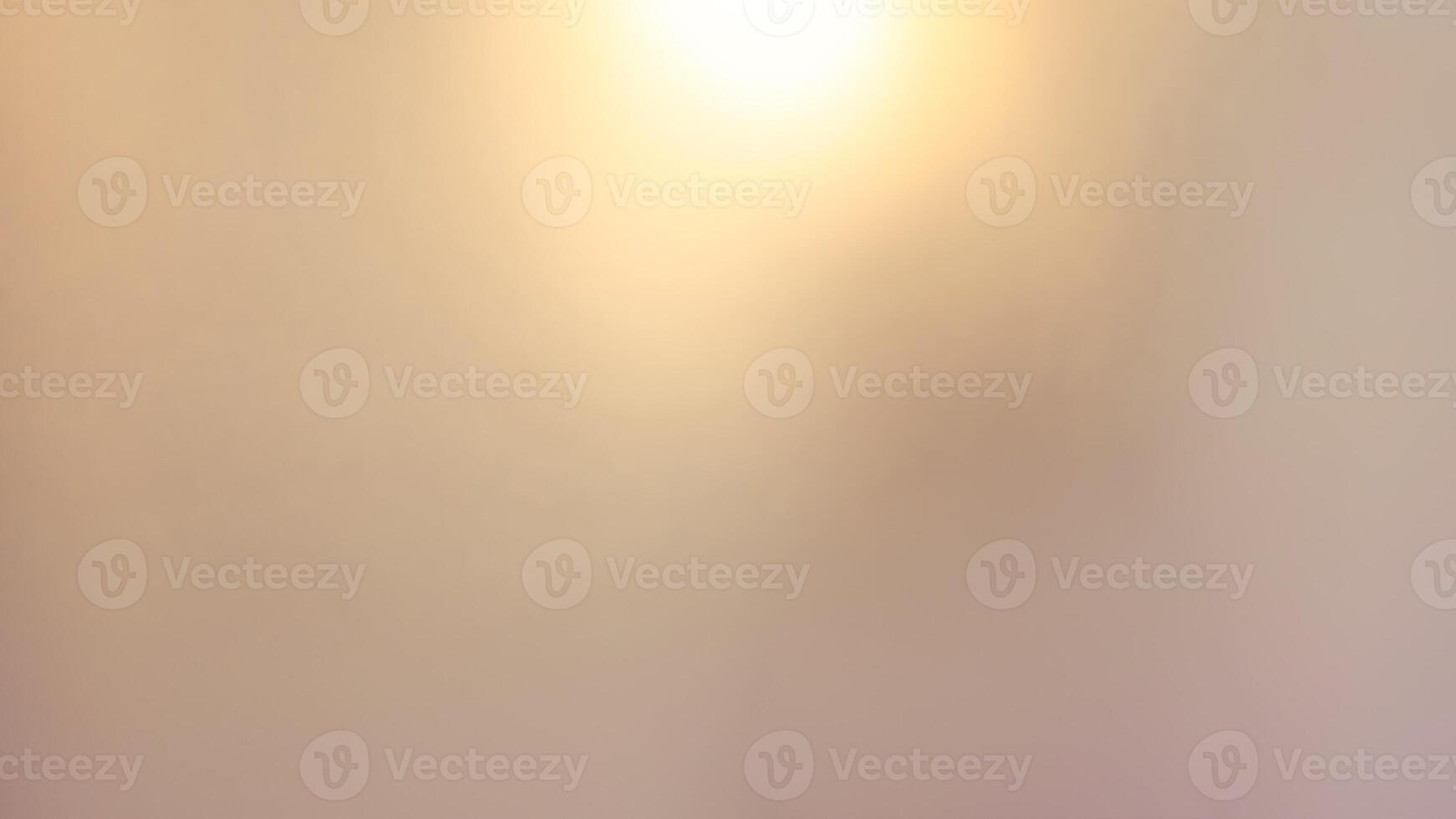 Golden bokeh festive background with soft, twinkling lights and a glowing effect photo