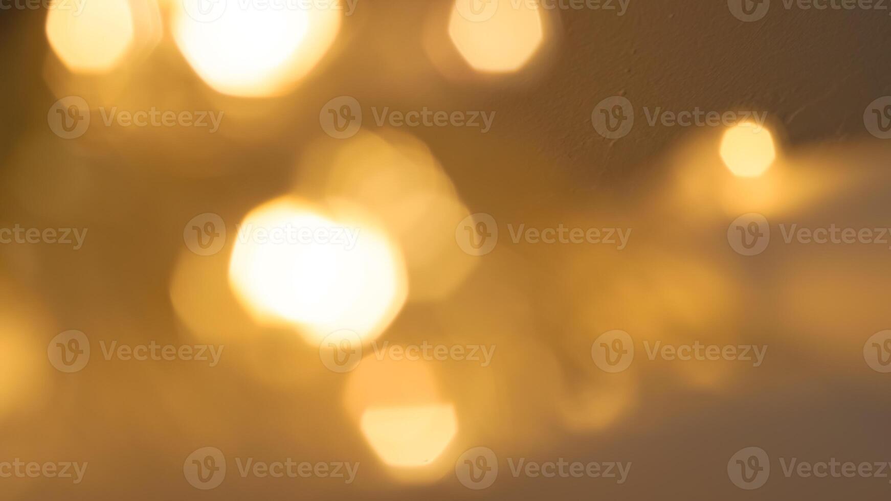 Golden bokeh lights with a soft and elegant glow, perfect for holiday celebrations photo