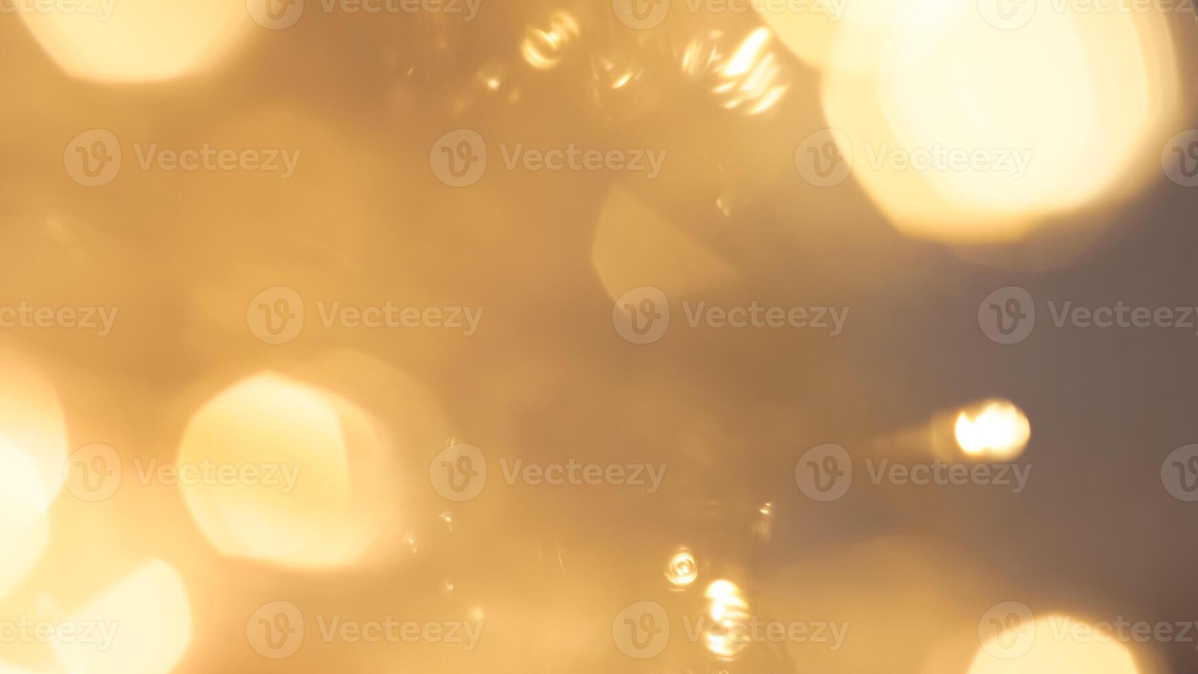 Vibrant festive golden bokeh with sparkling lights and a warm holiday glow photo