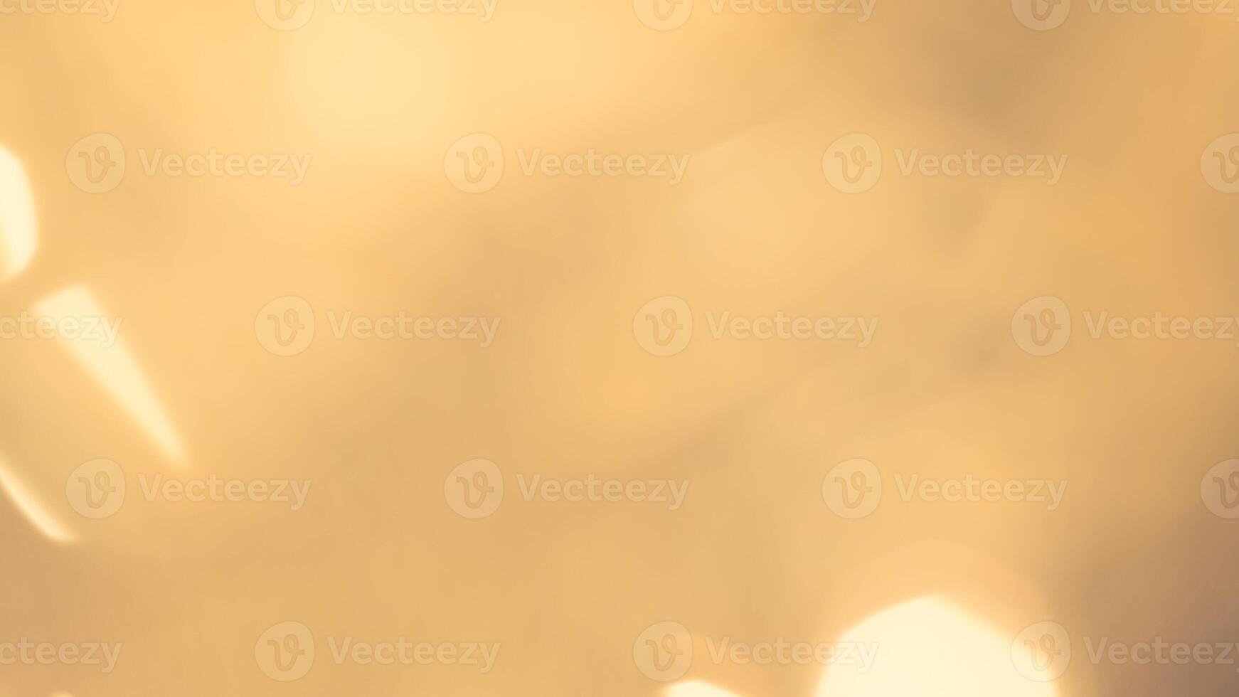 Bright golden bokeh lights create a festive and sparkling holiday ambiance photo