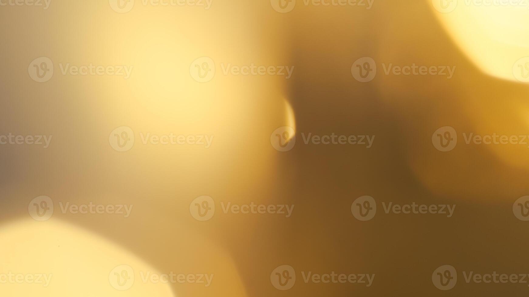 Golden bokeh festive background with soft, twinkling lights and a glowing effect photo