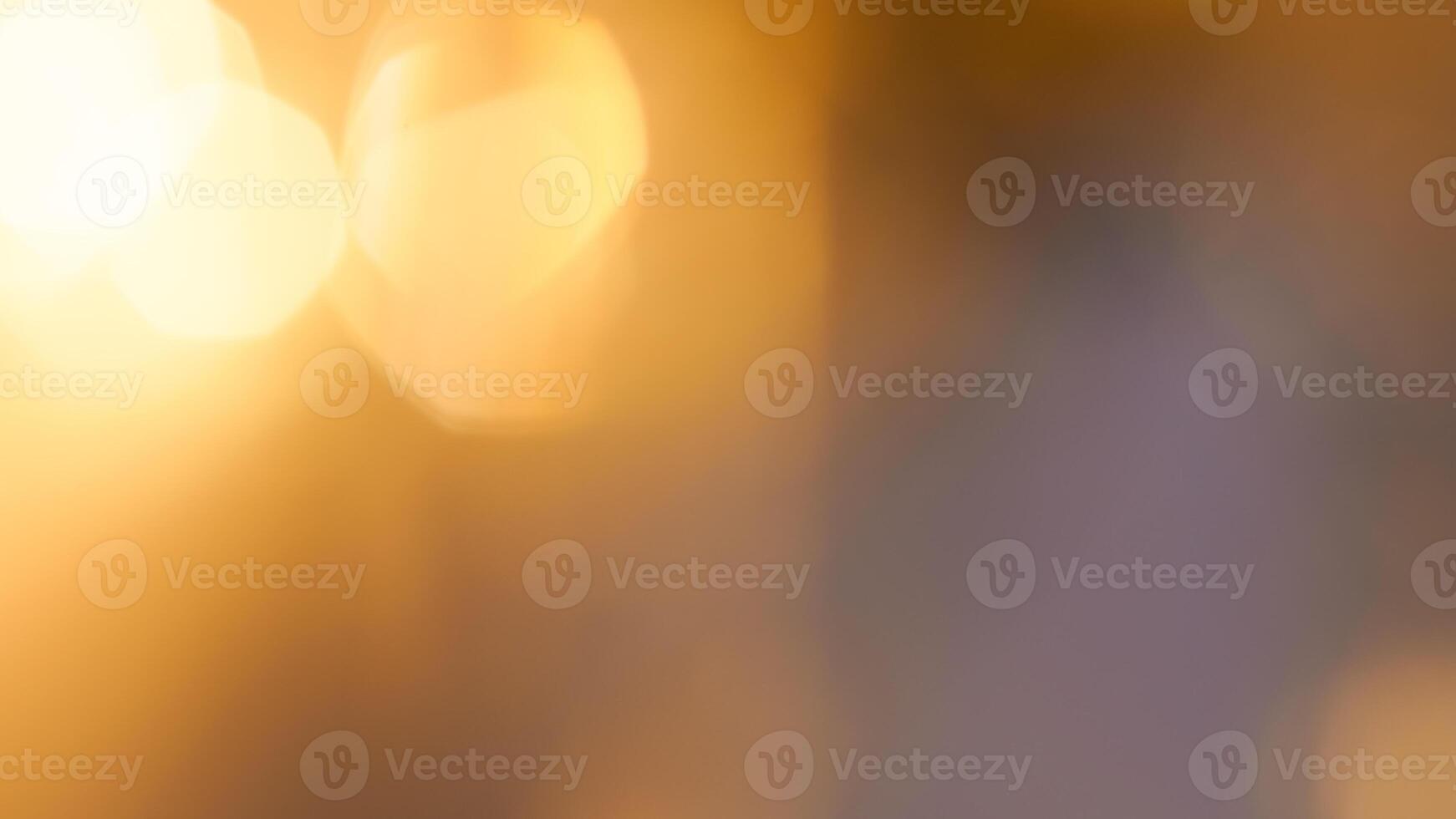 Golden bokeh festive background with soft, twinkling lights and a glowing effect photo