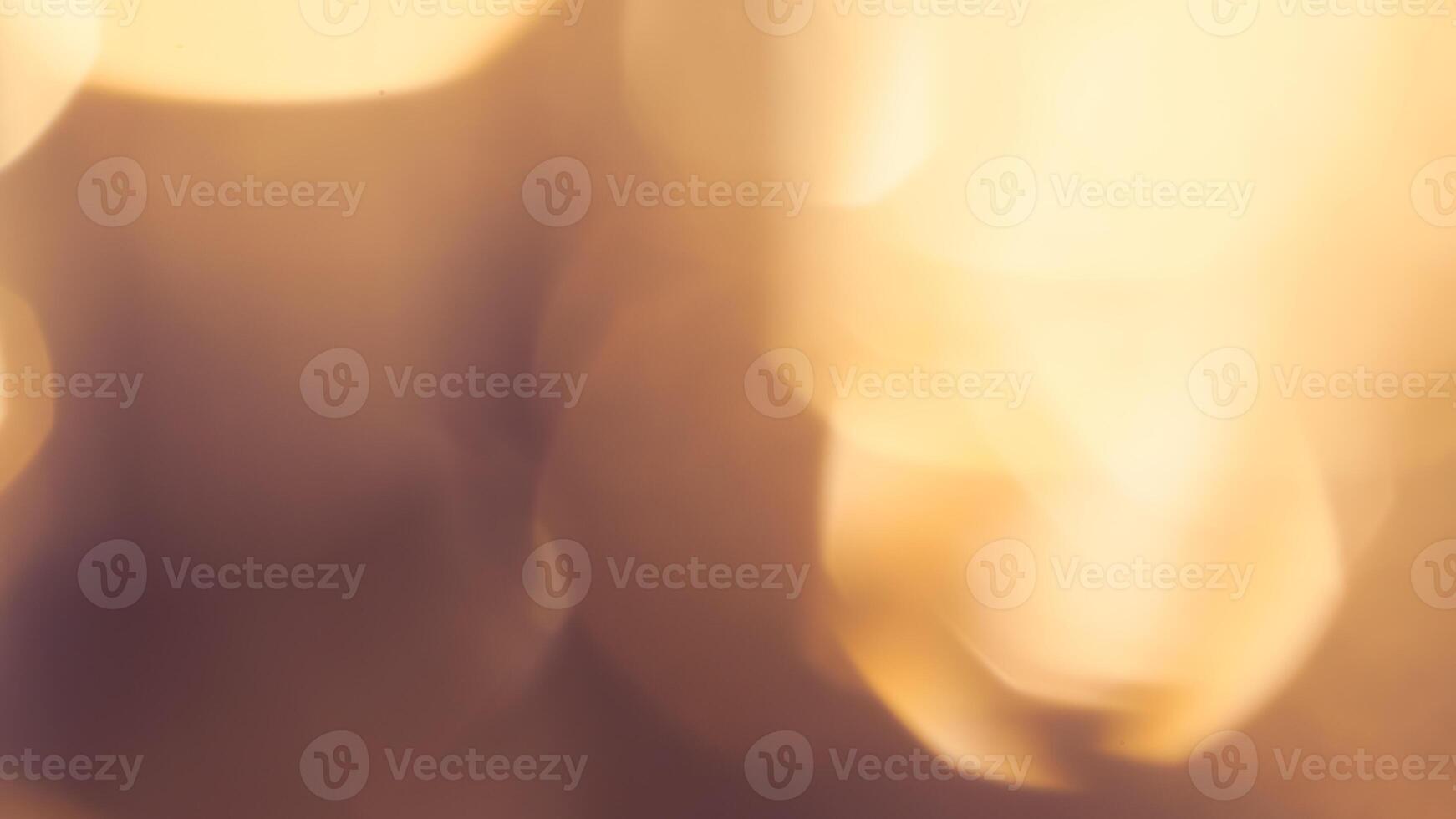 Bright golden bokeh lights create a vibrant and festive holiday background photo