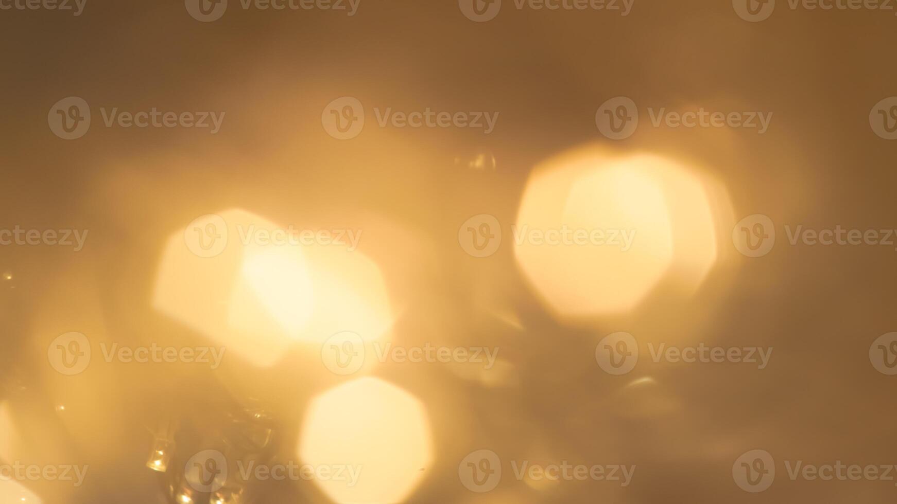Vibrant festive golden bokeh with sparkling lights and a warm holiday glow photo