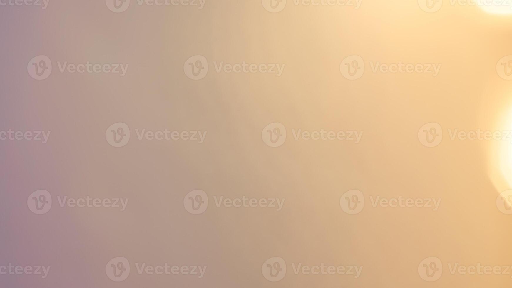 Bright golden bokeh lights create a vibrant and festive holiday background photo
