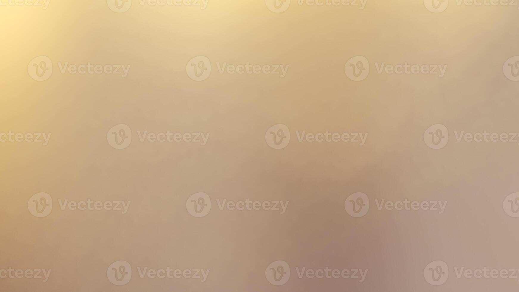 Warm glowing bokeh lights in a golden festive background for holiday celebrations photo