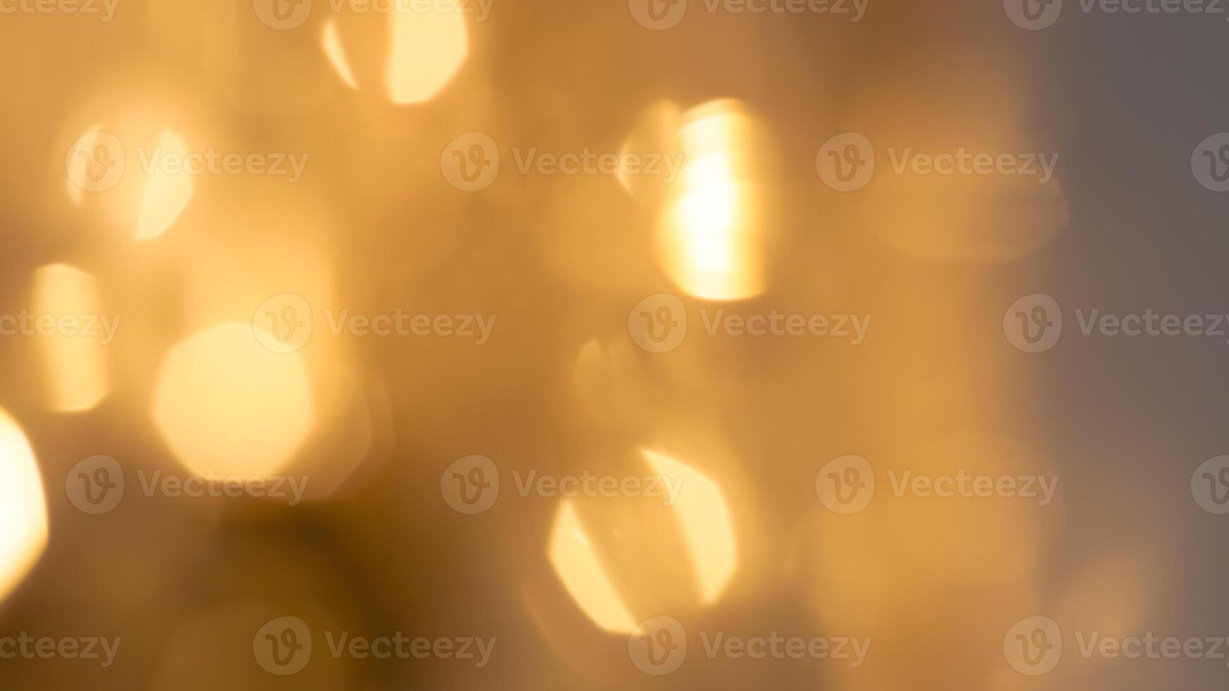 Soft golden bokeh background with a subtle glowing and elegant festive ambiance photo