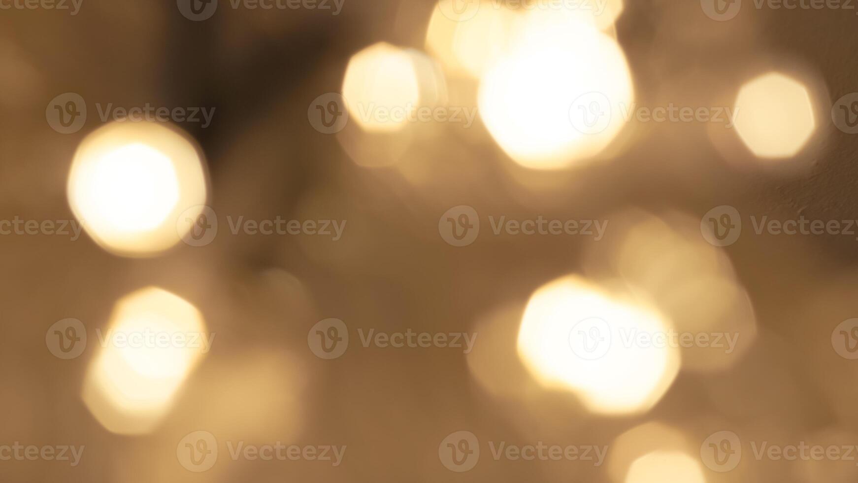 Golden bokeh lights with a soft and elegant glow, perfect for holiday celebrations photo