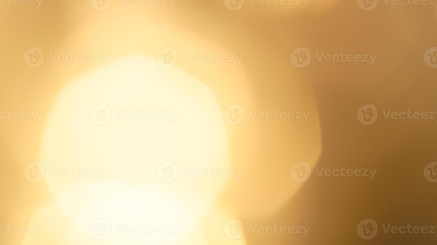 Golden bokeh festive lights with a soft, warm glow creating a cheerful atmosphere photo