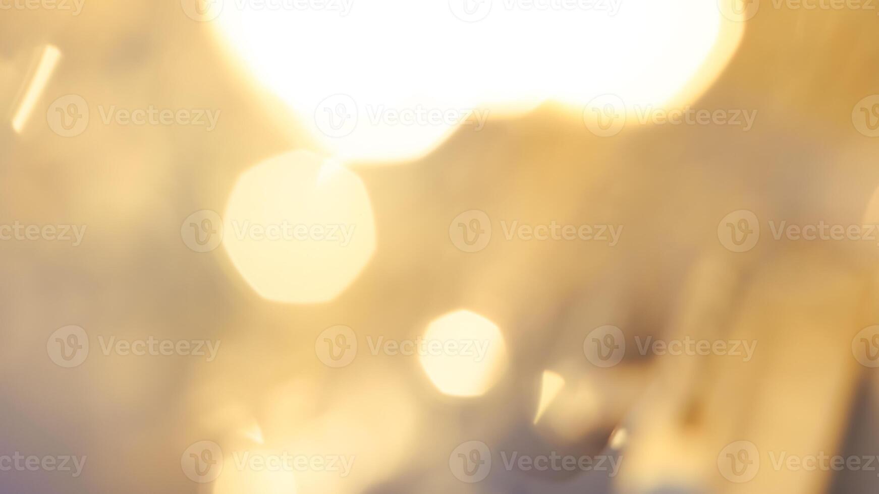 Soft golden bokeh background with a subtle glowing and elegant festive ambiance photo