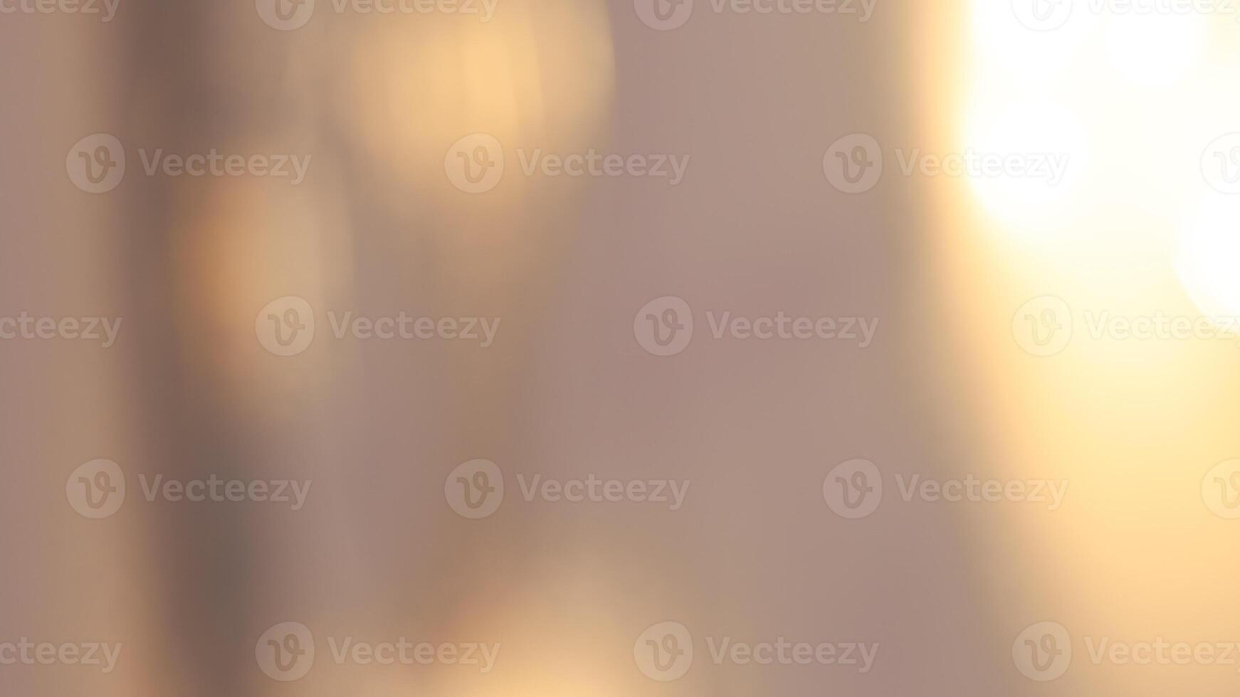 Warm glowing bokeh lights in a golden festive background for holiday celebrations photo