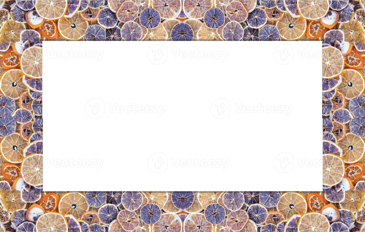 Frame of dry slices of orange and grapefruit. Fruit chips background. photo