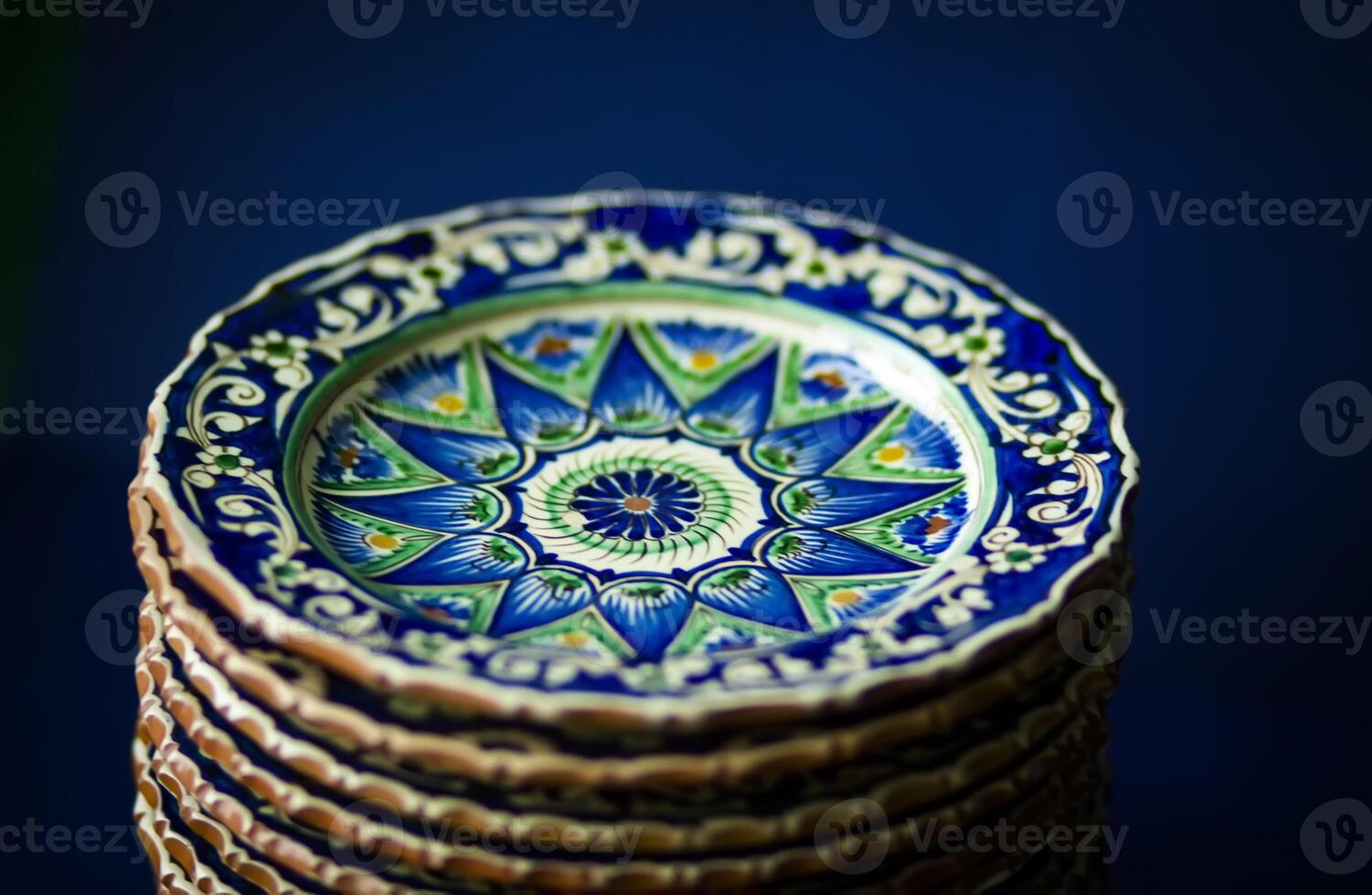 Decorative ceramic plates with ornamental pattern. photo