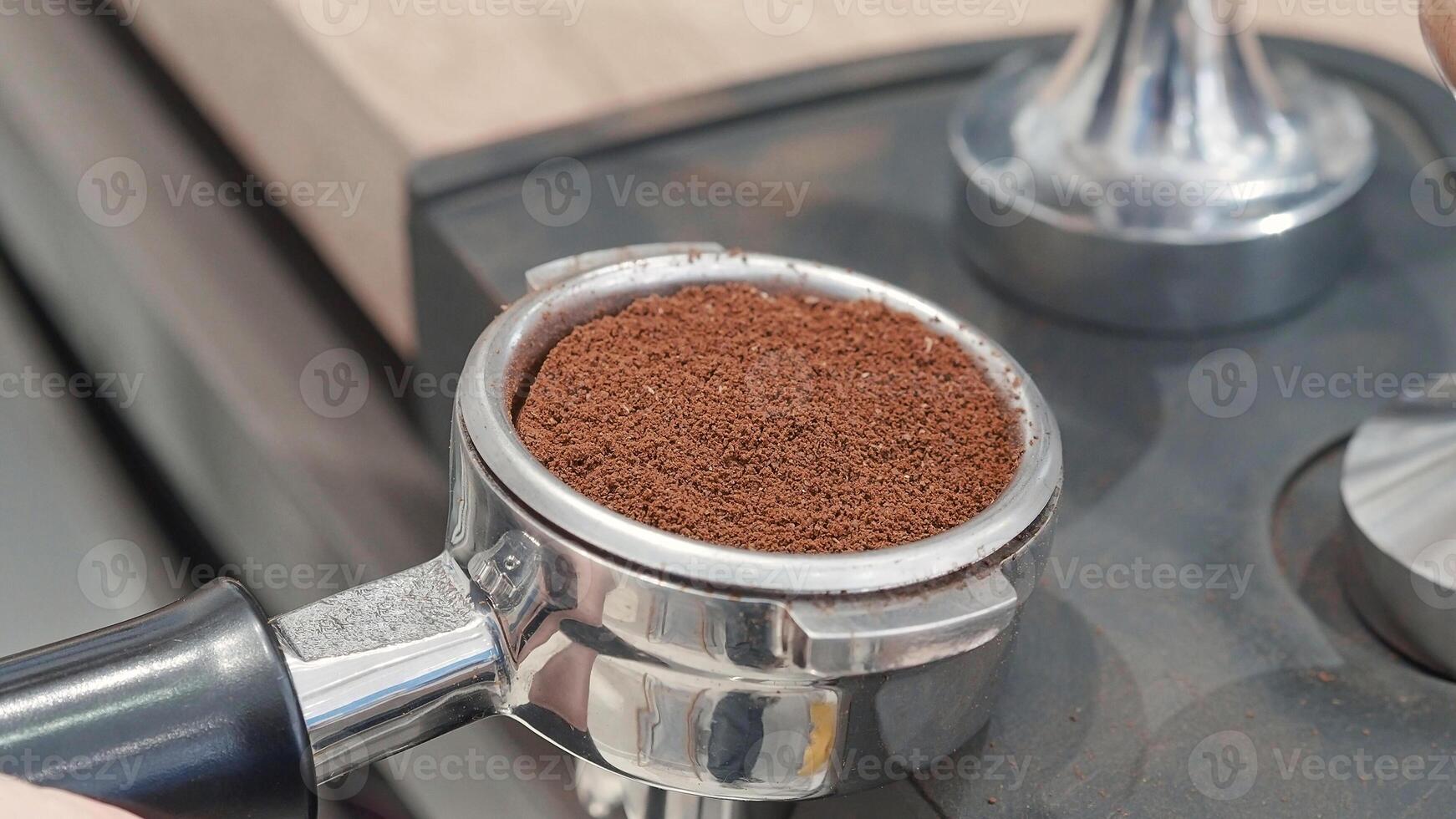 Fresh Ground Coffee in Portafilter Ready for Tamping. photo