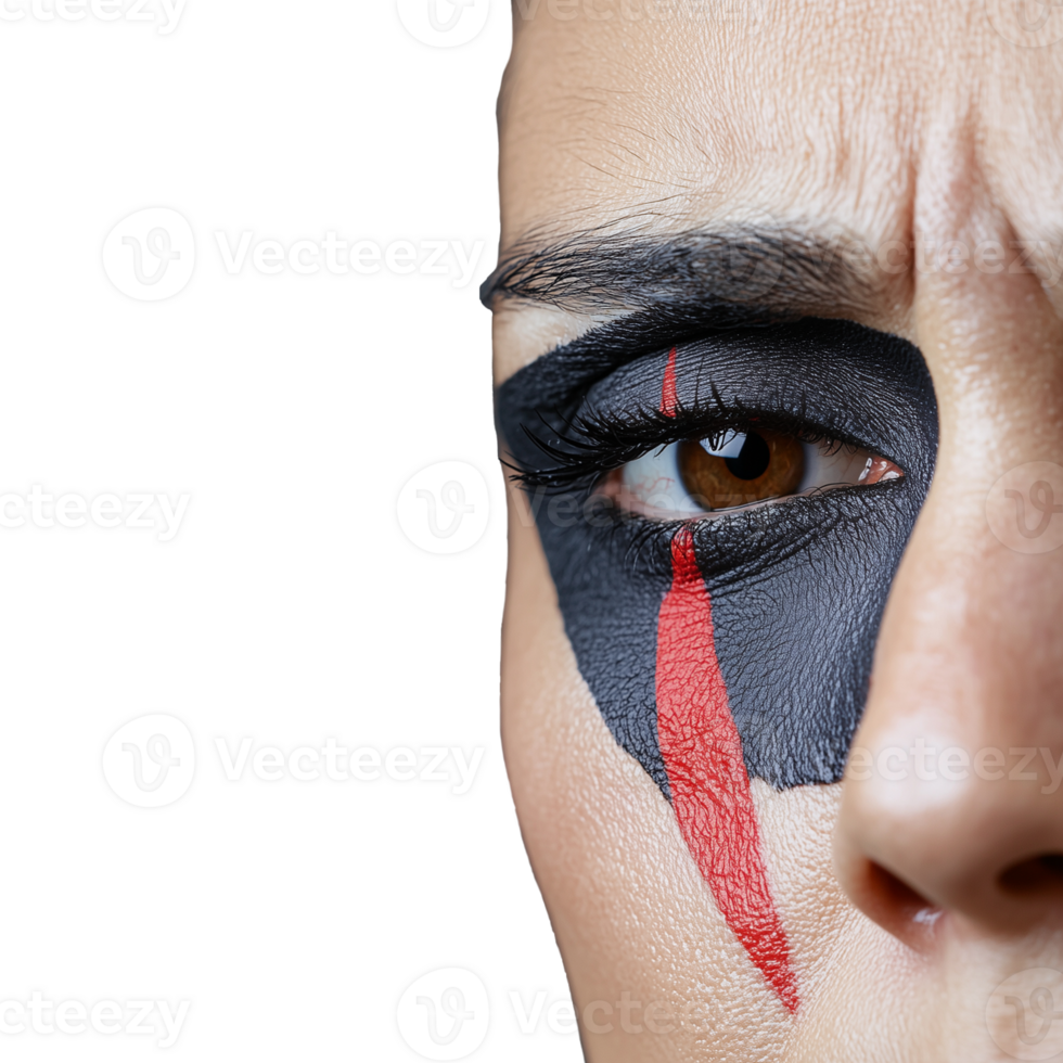 Intense close-up of a womans eye with dramatic black and red face paint on transparent background png