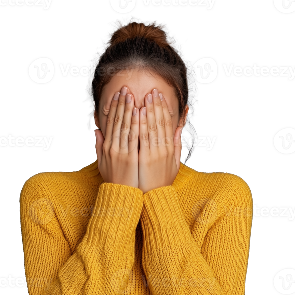 Woman covering her face with hands in yellow sweater on transparent background png