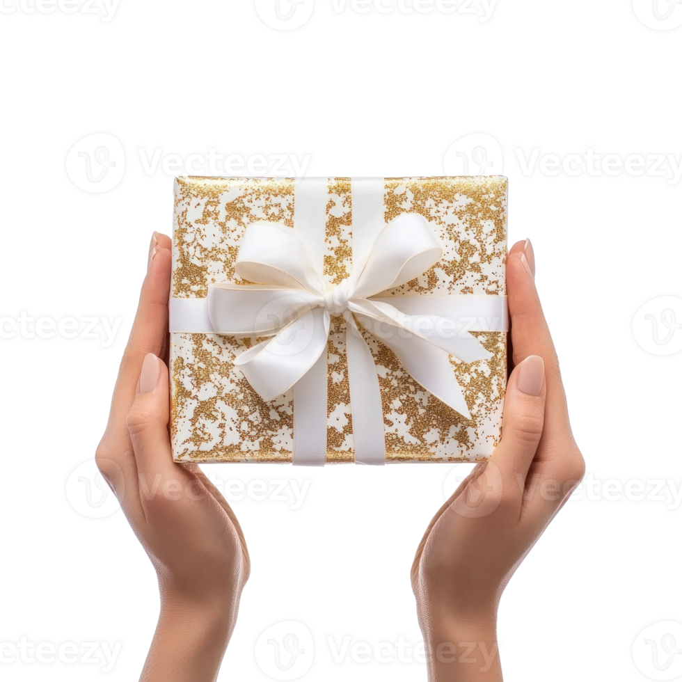 hands holding gift box with white and gold ribbon and bow side view isolate on transparent background png