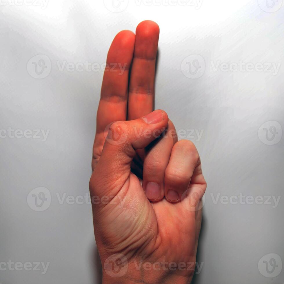 Letter U in American Sign Language ASL for deaf people photo